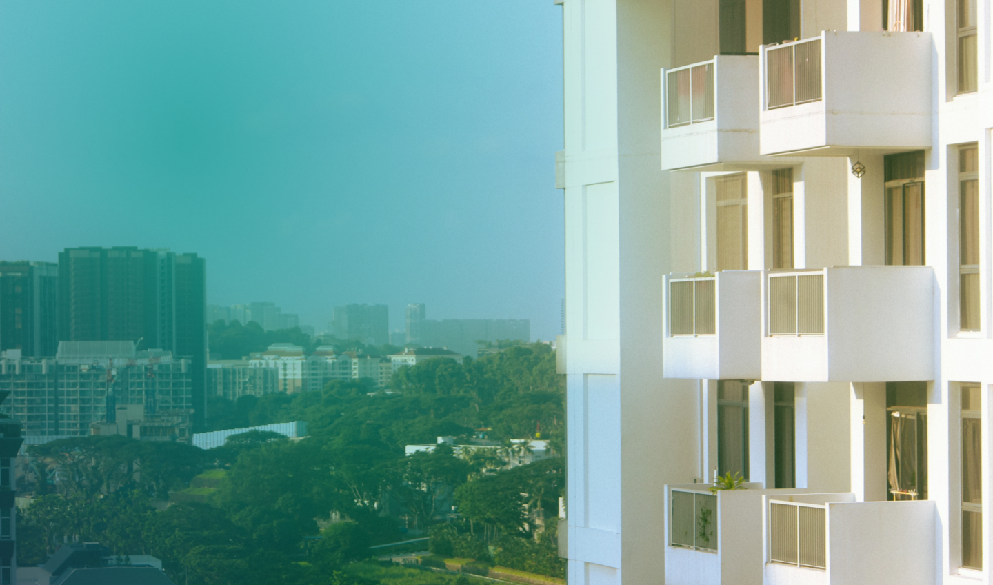 Background image. A condominium and the city.